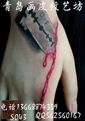 手上個性紋身圖案青島畫皮紋藝坊圖片